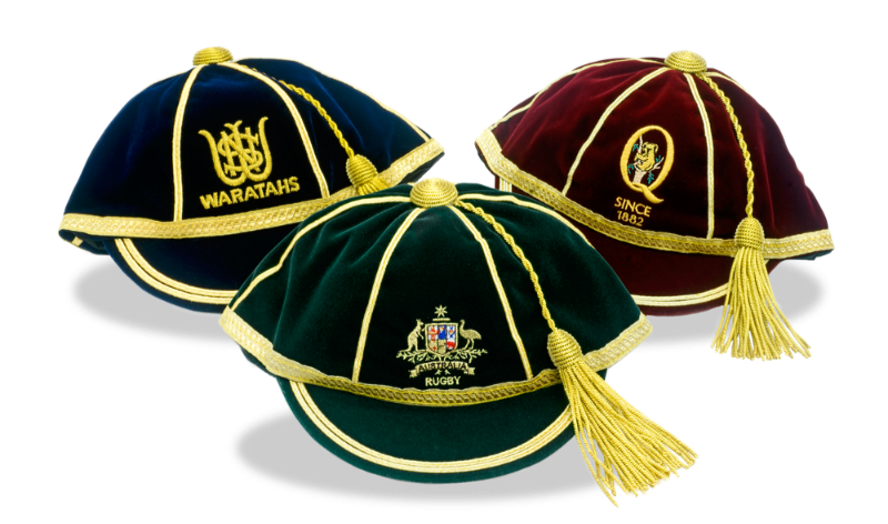 Three velvet honours caps with gold trim and tassels, featuring, Waratahs, Queensland Rugby and Rugby Australia embroidered logos.
