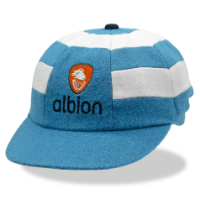 Black and red hooped baggy cap with orange Albion logo embroidered on the front.