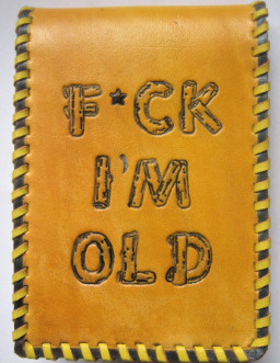 Leather A7 Pocket notebook cover, lettering in log font stamped, handmade in Australia.